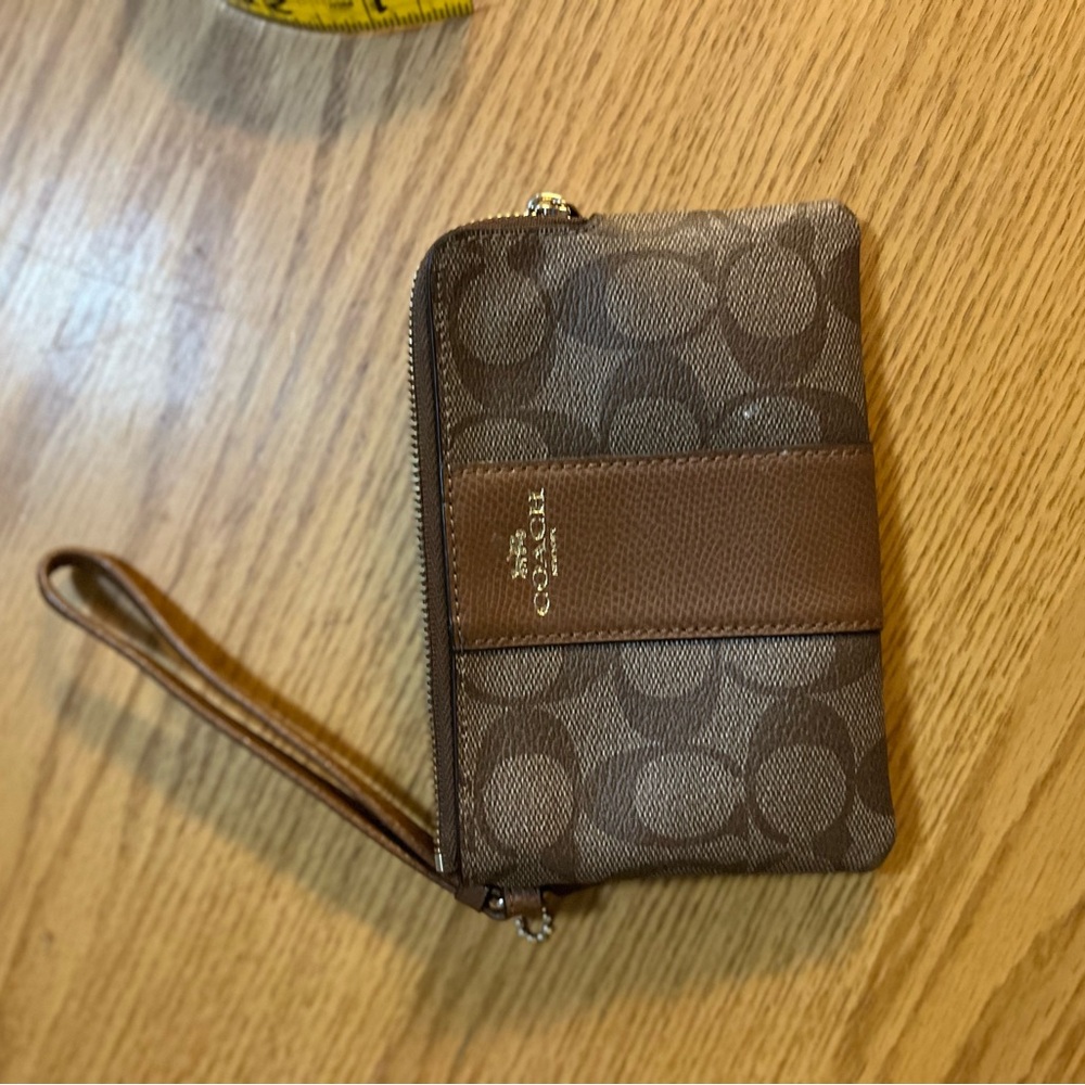 Coach wristlet brown and tan with gold hardware